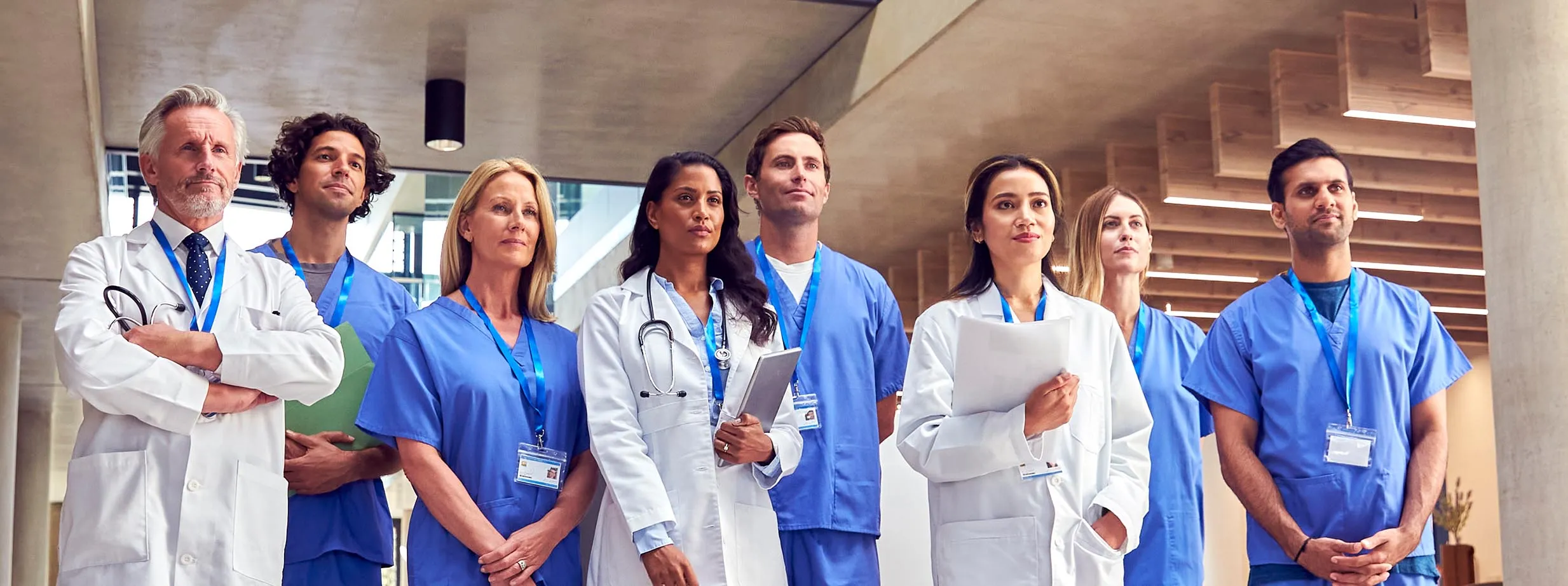 group of doctors and nurses outside the hospital